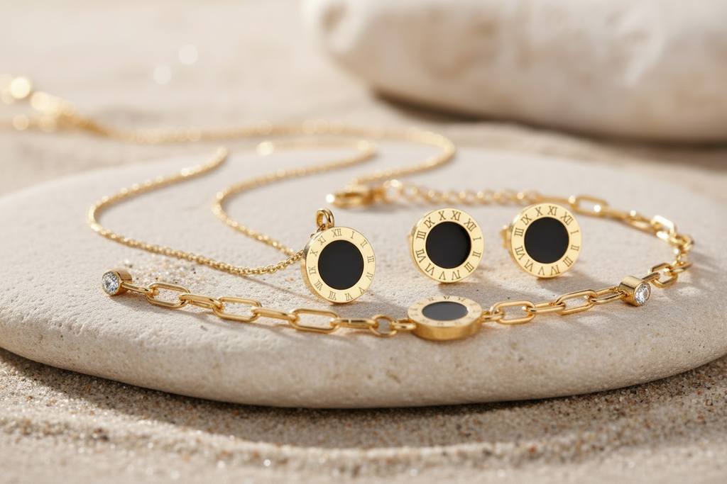 Daniella 18K Gold Plated Roman Numeral Bracelet - Daniella Earrings, Pendant and Bracelet Set on Stone Prop | Amalfi Lane