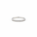 Neve rhodium plated CZ half band ring on white background