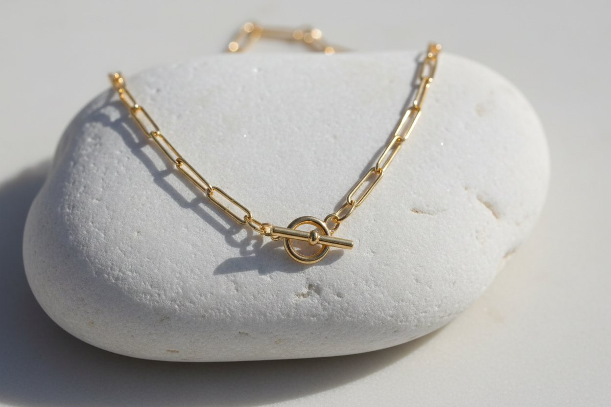 Josie 18K Gold Plated Paperclip Link Fob Chain Necklace - Necklace Displayed on a Stone | Amalfi Lane