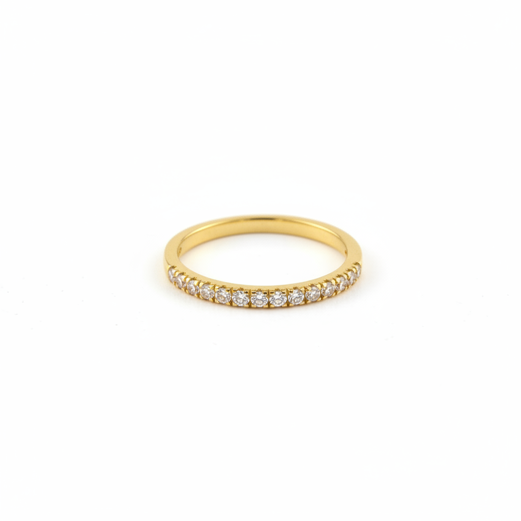 Neve gold CZ ring flat lay white background