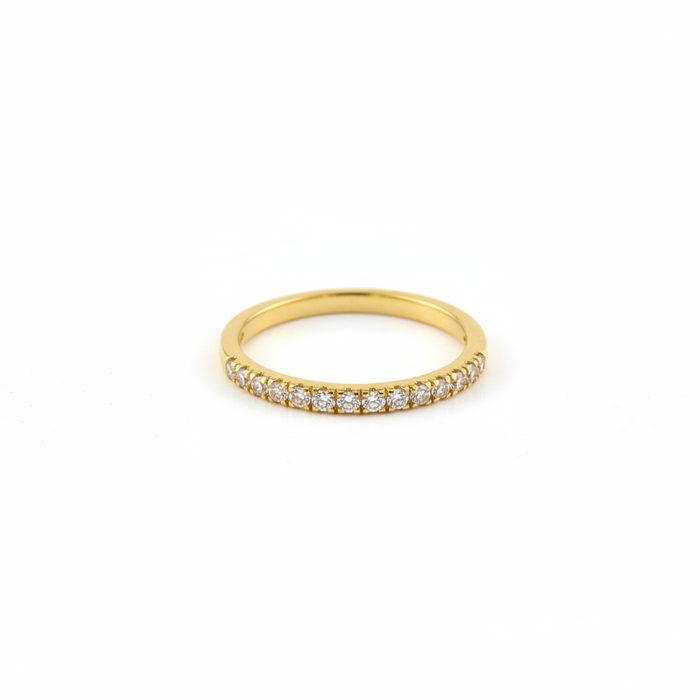 Neve gold CZ ring flat lay white background