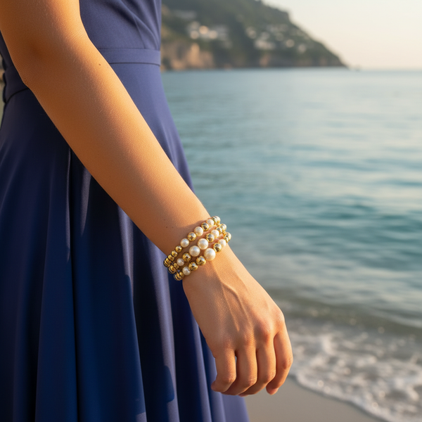 Perla bracelet smaller on model at Mediterranean beach