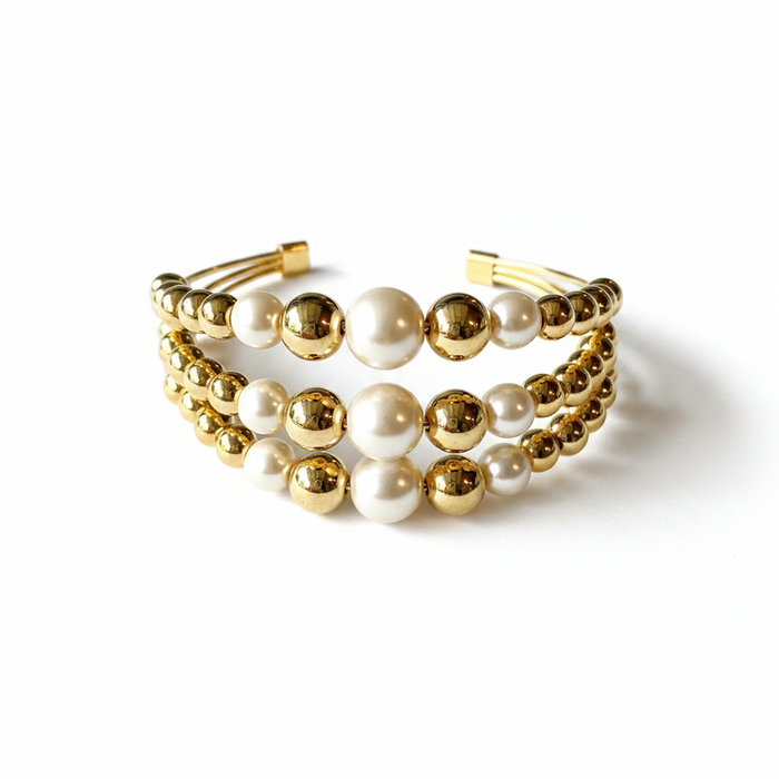 Perla 18K gold plated triple-strand pearl and gold bead cuff bracelet on white background — Sun-Kissed Collection | Amalfi Lane Australia