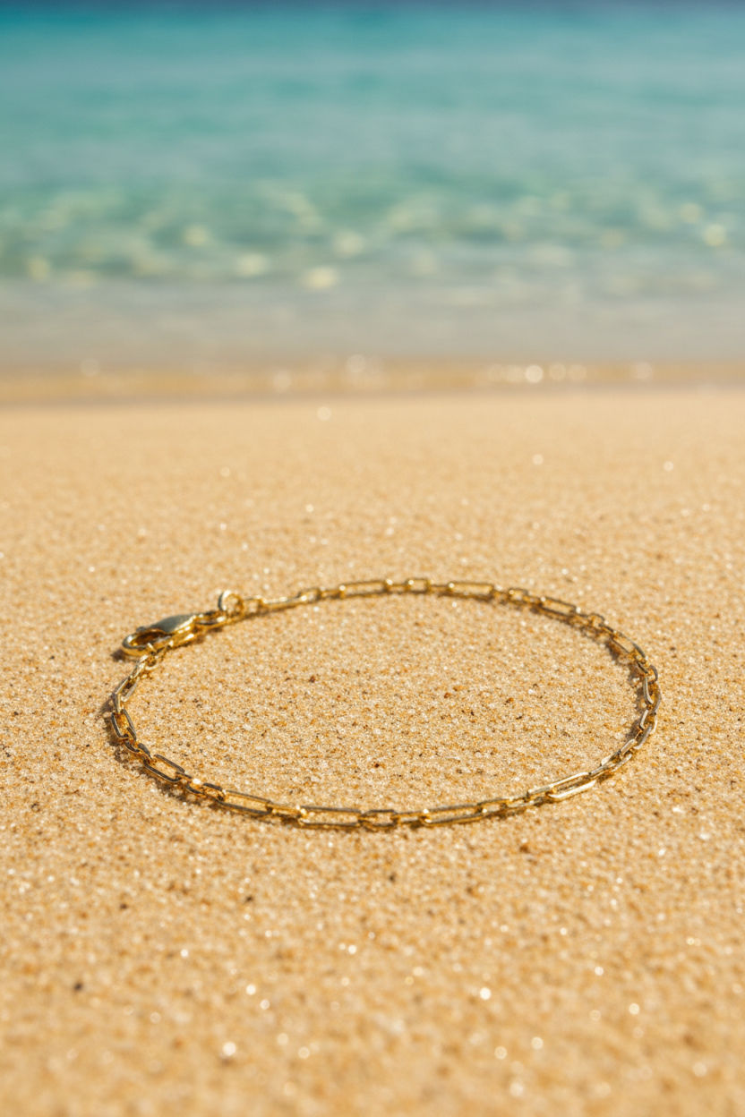 Serena 18K Gold-Filled Dainty Paperclip Bracelet Flat Lay on Beach Sand — Forever Amalfi Gold-Filled Range | Amalfi Lane Australia