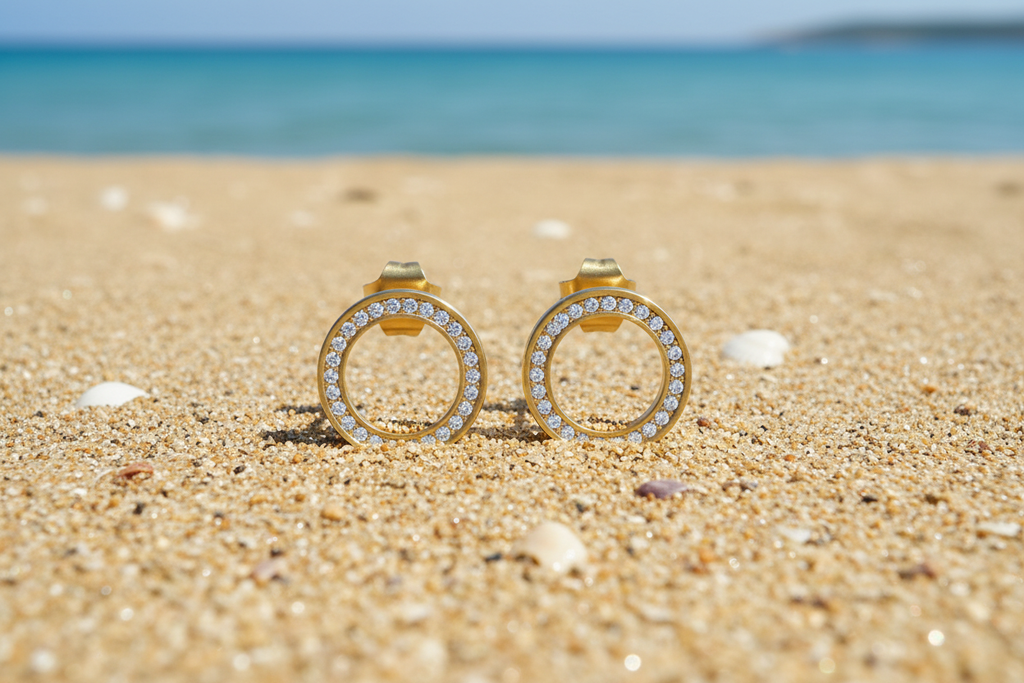 Sofia 18K Gold Plated Cubic Zirconia Stud Earrings - Earring Sitting Upright in the Sand | Amalfi Lane