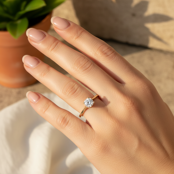Sola brilliant cut solitaire ring on hand model