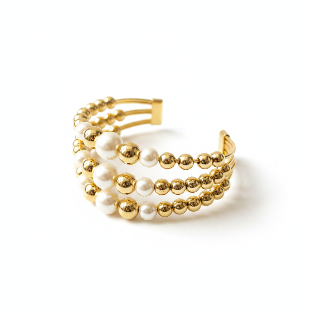Perla 18K gold plated triple-strand pearl and gold bead cuff bracelet on white background angled view — Sun-Kissed Collection | Amalfi Lane Australia